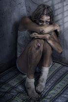 As Sloan approached the door, Paul Lyons lifted his eyes to watch her leave. He