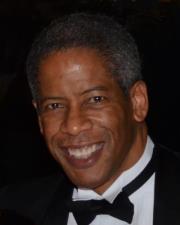 Lance E.