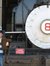 E B