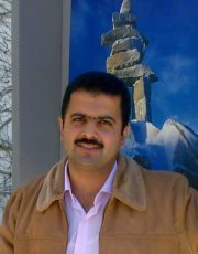 Husam F
