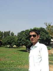 Karthik B.