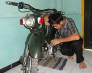 Maling Bertopi