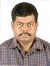 Ezhil K...