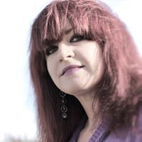 Ann J Dugos