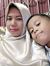 Rina Al...