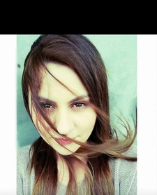 Corina A.
