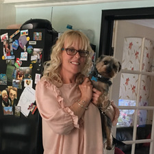 Debbie lost in a world of books.