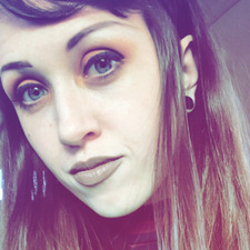 J.