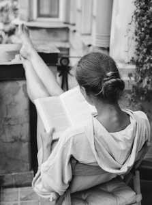 Ariana drinks tea and scrolls