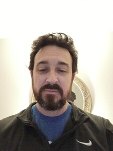 Nicholas E.
