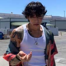 Em