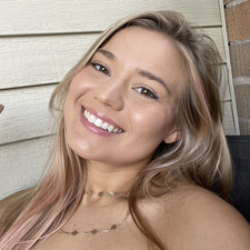 J B