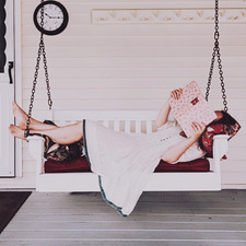On the swing with books