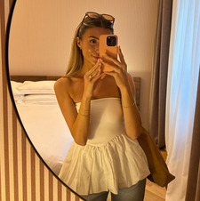Em