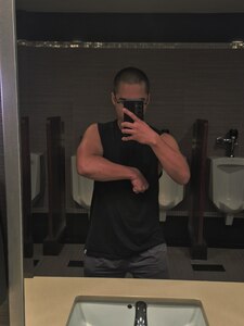 T.