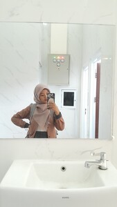 Neng  Della