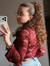 Bruna C...