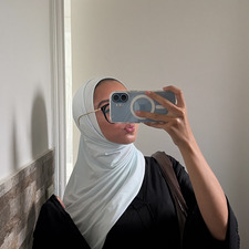 M.