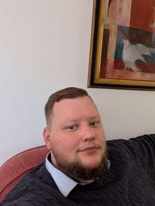 Adam  T