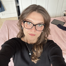 K.